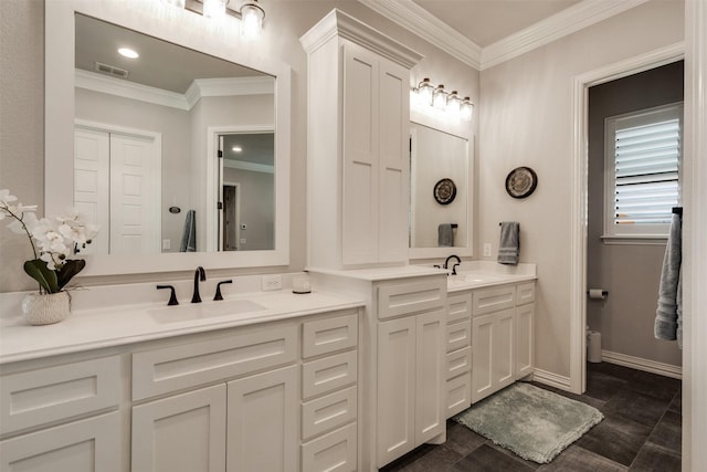 5124 Cathedral Ln, Wichita Falls, TX 76310 - full bathroom with visible vents, a sink, double vanity, and crown molding