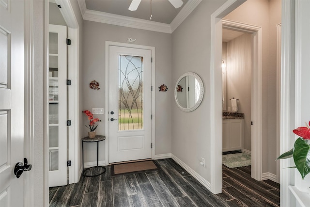 5124 Cathedral Ln, Wichita Falls, TX 76310 - entrance foyer with dark wood finished floors, baseboards, ornamental molding, and a ceiling fan