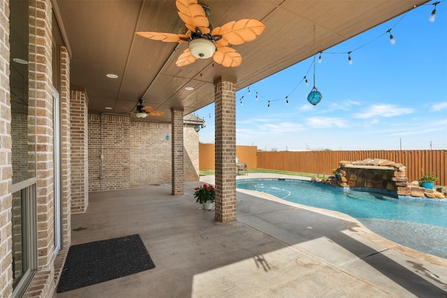 5124 Cathedral Ln, Wichita Falls, TX 76310 - view of swimming pool featuring a patio area, a ceiling fan, a fenced in pool, and a fenced backyard
