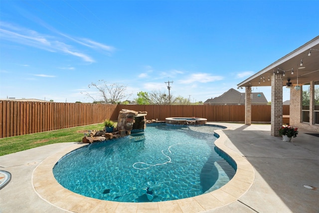 5124 Cathedral Ln, Wichita Falls, TX 76310 - view of swimming pool featuring a fenced backyard, ceiling fan, a patio area, and a pool with connected hot tub