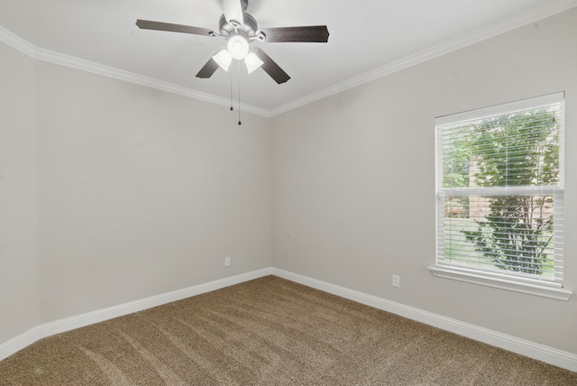 carpeted empty room with ceiling fan, a healthy amount of sunlight, baseboards, and ornamental molding