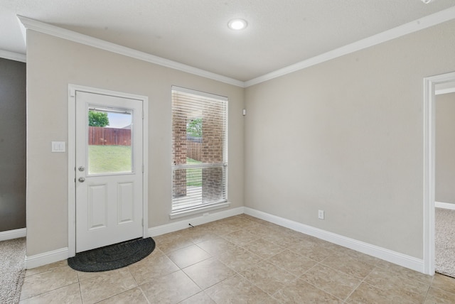 doorway with baseboards, ornamental molding, and light tile patterned floors