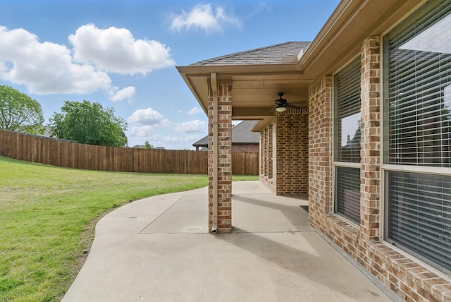 view of patio / terrace with a fenced backyard and a ceiling fan
