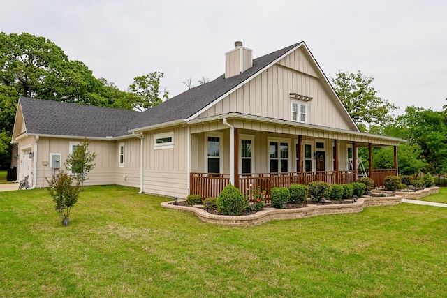 view of front of house with a chimney, board and batten siding, a porch, a front yard, and roof with shingles