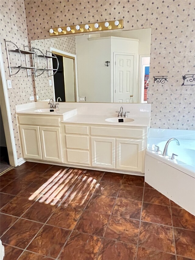 2210 Fairlands Dr, Garland, TX 75040 - bathroom featuring wallpapered walls, a sink, and double vanity