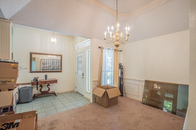 carpeted foyer entrance with lofted ceiling, tile patterned floors, a chandelier, and a decorative wall