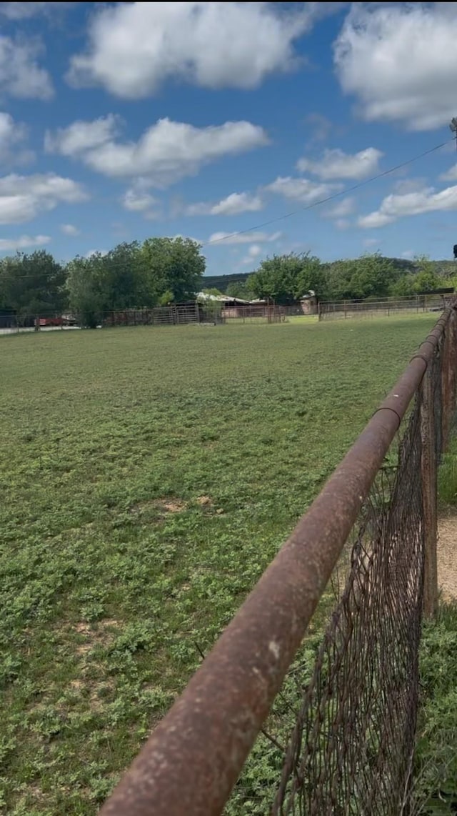 458 Jackson Ave, Strawn, TX 76475 - view of yard featuring fence and a rural view