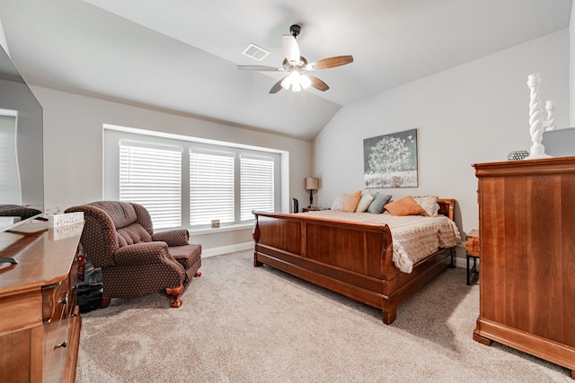 bedroom with lofted ceiling, visible vents, a ceiling fan, baseboards, and light colored carpet