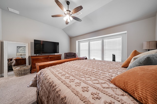 carpeted bedroom with lofted ceiling, visible vents, and ceiling fan