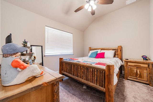 carpeted bedroom with lofted ceiling, visible vents, and ceiling fan