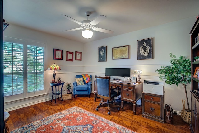 home office with a ceiling fan and wood finished floors