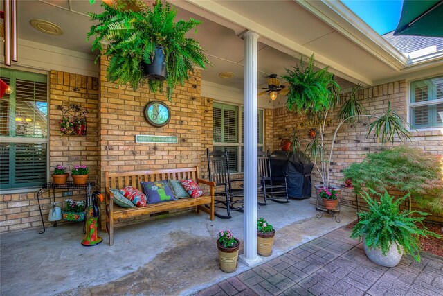 view of patio featuring grilling area and a ceiling fan