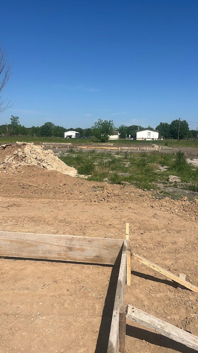 view of yard featuring a rural view