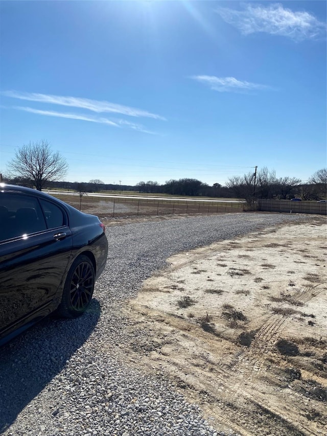 view of road with a rural view