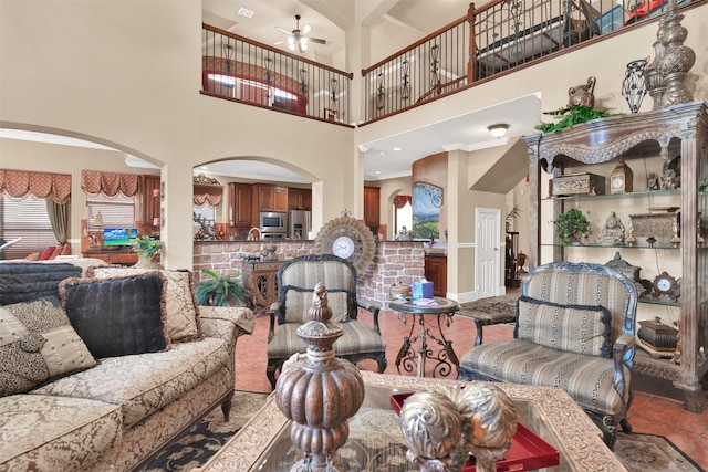 1547 Sandstone Dr, Frisco, TX 75034 - kitchen featuring dark stone countertops, arched walkways, visible vents, and stainless steel appliances