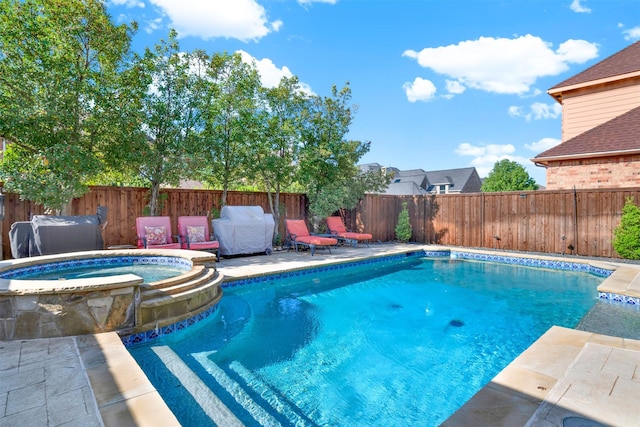 1547 Sandstone Dr, Frisco, TX 75034 - view of pool with a pool with connected hot tub, a fenced backyard, and a patio area