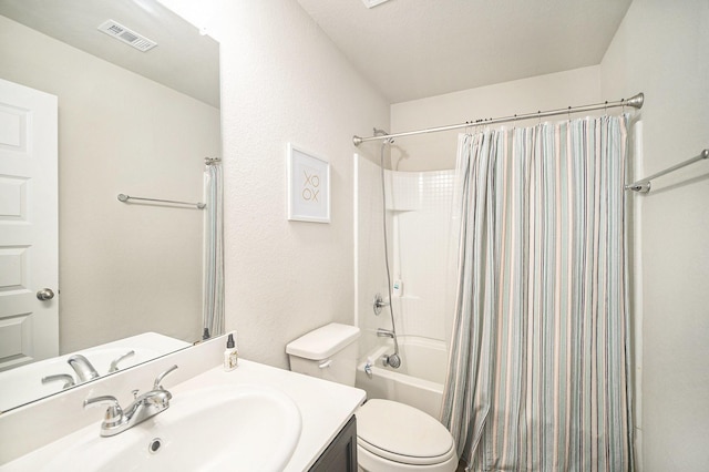 full bathroom with toilet, shower / bath combo with shower curtain, vanity, and visible vents