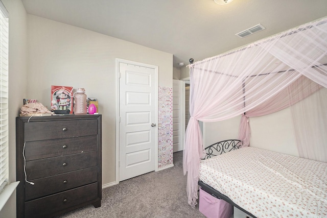bedroom featuring visible vents and carpet
