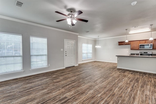 unfurnished living room with baseboards, visible vents, ceiling fan with notable chandelier, dark wood-type flooring, and ornamental molding