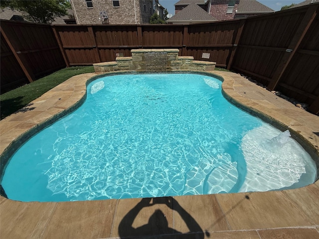 view of pool with a fenced in pool and a fenced backyard