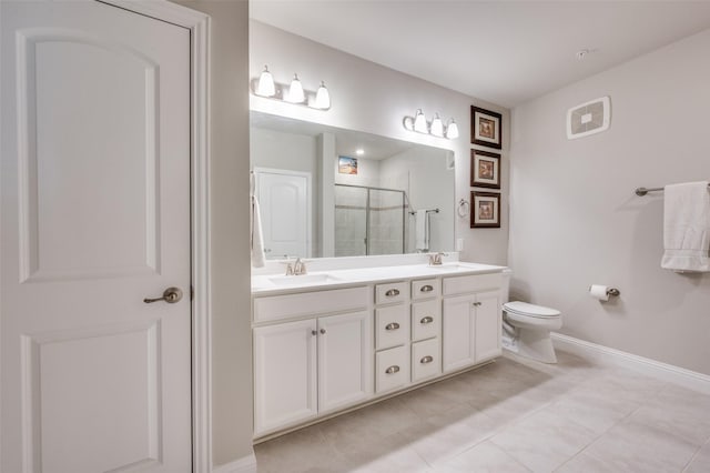 full bath with a sink, double vanity, a stall shower, baseboards, and tile patterned flooring