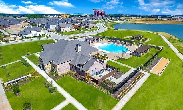 aerial view featuring a water view