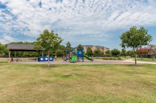 communal playground with a gazebo and a yard