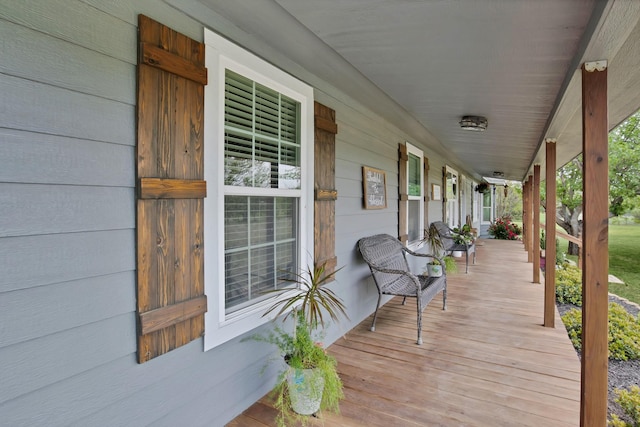 184 Wildflower Trl, Weatherford, TX 76087 - wooden deck featuring covered porch