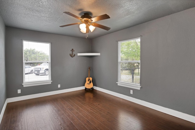 184 Wildflower Trl, Weatherford, TX 76087 - spare room with a ceiling fan, a wealth of natural light, and a textured ceiling