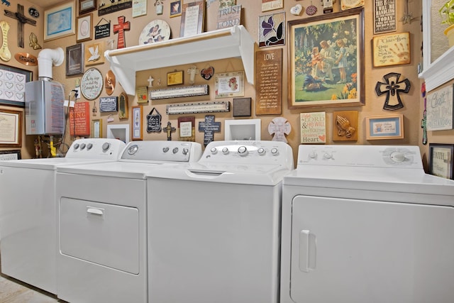 184 Wildflower Trl, Weatherford, TX 76087 - laundry room featuring laundry area and washer and clothes dryer