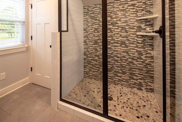 3050 County Road 3707, Bullard, TX 75757 - bathroom with a shower stall, tile patterned flooring, and baseboards