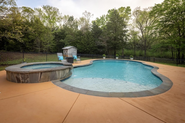 3050 County Road 3707, Bullard, TX 75757 - view of swimming pool with fence, a pool with connected hot tub, a shed, an outbuilding, and view of scattered trees