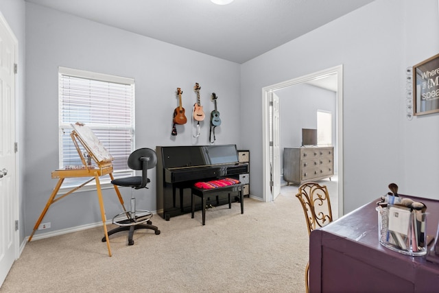 home office with baseboards and carpet flooring