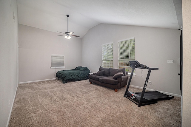 carpeted bedroom featuring lofted ceiling, a ceiling fan, and baseboards