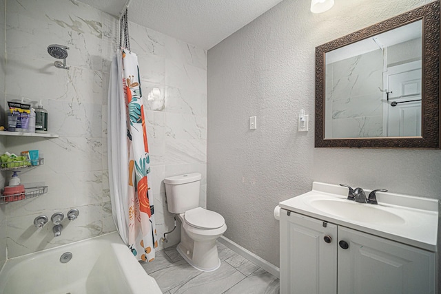 bathroom featuring vanity, marble finish floor, a textured wall, toilet, and shower / bath combo with shower curtain
