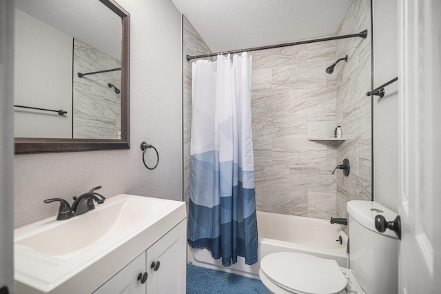 full bath with shower / tub combo, toilet, vanity, and a textured ceiling