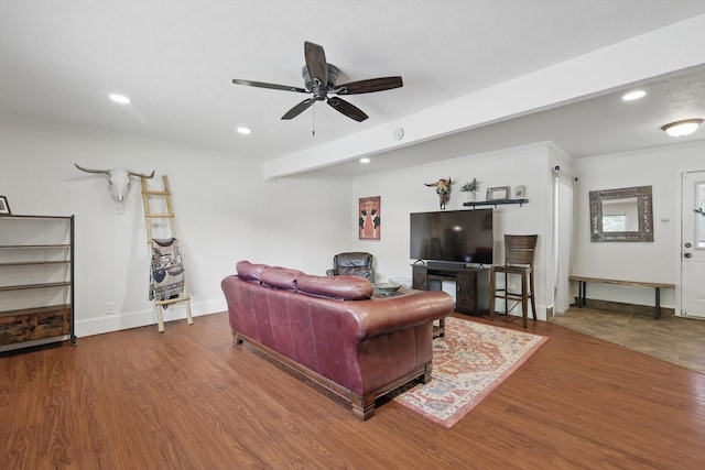 living room featuring recessed lighting, a ceiling fan, baseboards, and wood finished floors