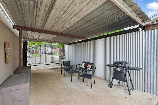 view of patio / terrace featuring a gate and grilling area