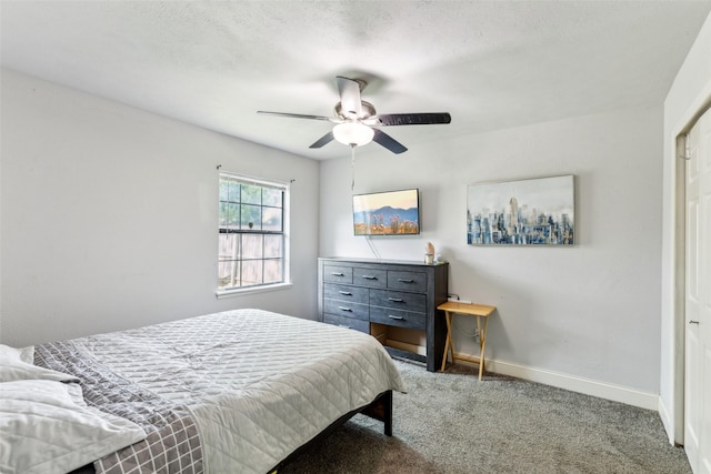 7012 Newberry Ct E, Fort Worth, TX 76120 - carpeted bedroom with baseboards and ceiling fan