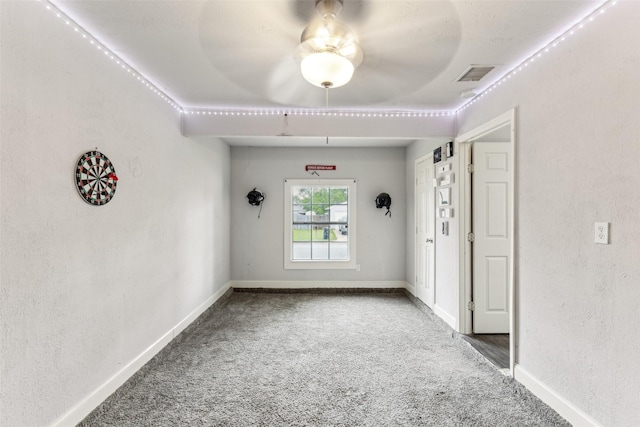 7012 Newberry Ct E, Fort Worth, TX 76120 - carpeted spare room featuring visible vents, baseboards, and ceiling fan