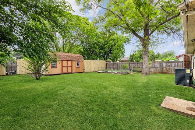 7012 Newberry Ct E, Fort Worth, TX 76120 - view of yard featuring central air condition unit, a storage shed, an outdoor structure, and a fenced backyard