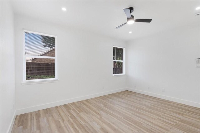 1941 Juniper Dr, Little Elm, TX 75068 - unfurnished room featuring a ceiling fan, light wood finished floors, baseboards, healthy amount of natural light, and recessed lighting