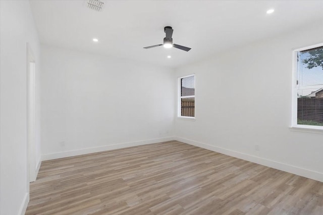 1941 Juniper Dr, Little Elm, TX 75068 - spare room featuring healthy amount of natural light, light wood-type flooring, baseboards, recessed lighting, and a ceiling fan