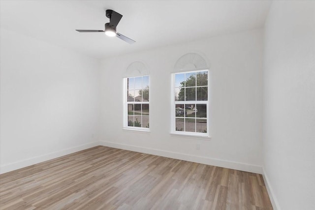1941 Juniper Dr, Little Elm, TX 75068 - unfurnished room with light wood-style flooring, baseboards, and a ceiling fan