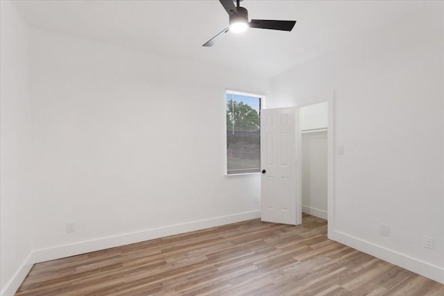 1941 Juniper Dr, Little Elm, TX 75068 - unfurnished bedroom featuring light wood-type flooring, baseboards, and ceiling fan