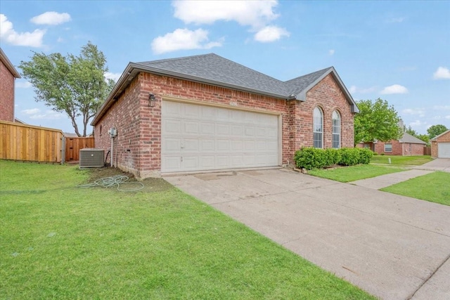 1941 Juniper Dr, Little Elm, TX 75068 - view of front of home featuring brick siding, roof with shingles, driveway, a garage, and central AC