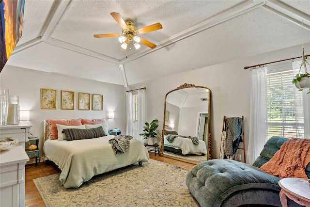 bedroom featuring a ceiling fan and wood finished floors