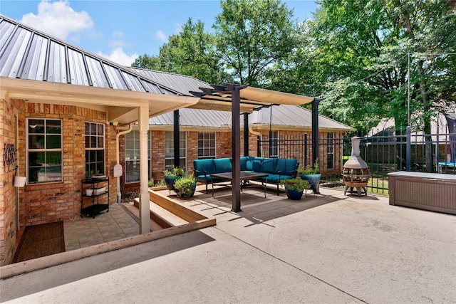 view of patio / terrace with outdoor lounge area and fence