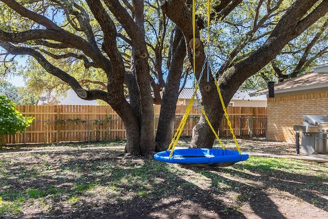 view of yard featuring fence