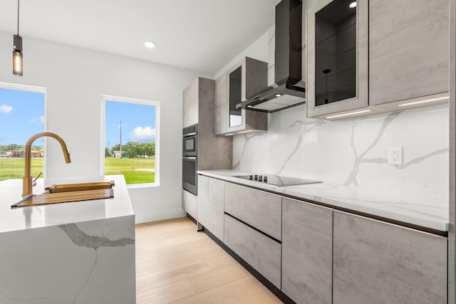 1926 Pueblo St, Dallas, TX 75212 - kitchen with a sink, wall chimney exhaust hood, black electric stovetop, and a healthy amount of sunlight